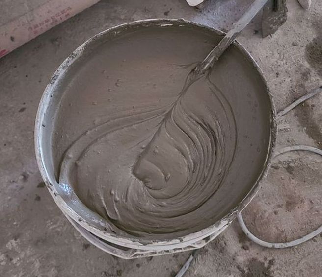 水泥师傅用水泥拉花，照片曝光后惊呆上千名网友。（图／路上观察学院）