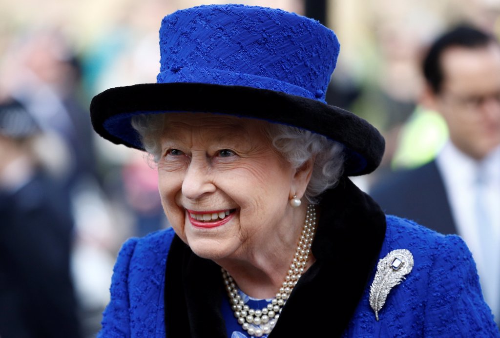 英国女王钟爱全身同色系的穿搭风格，也喜欢在礼帽上展现个性。（图／路透社）(photo:ChinaTimes)
