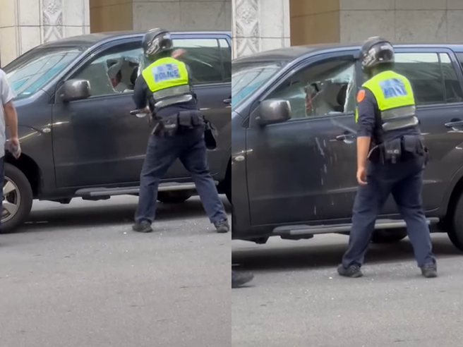 男子酒后驾车被警员拦查，竟一路拒检并连闯红灯，最后困在车阵中仍不愿开门，警员最后索性拿警棍猛砸车窗，车窗被砸破大洞，他才狼狈下车。（翻摄自脸书「重机车友❘各区路况天气、资讯分享中心」）