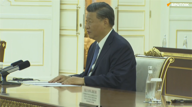 习普会15日登场，图为中国国家主席习近平正对俄罗斯总统普丁发言。（图／翻摄自俄罗斯卫星通讯社影片）