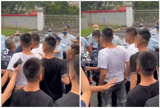 黑衣人群与警方发生衝突，一边朝员警推挤一边骂三字经。（翻摄脸书爆料公社）