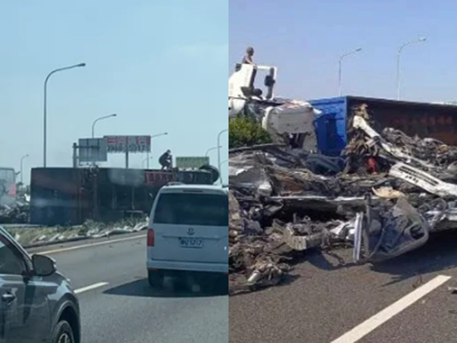 国道1号北上云林西螺路段今（13）下午1时许发生一辆载满废铁的联结车翻覆意外，车上载运的废铁全散落在车道上，波及三线车道。（翻摄自记者爆料网）