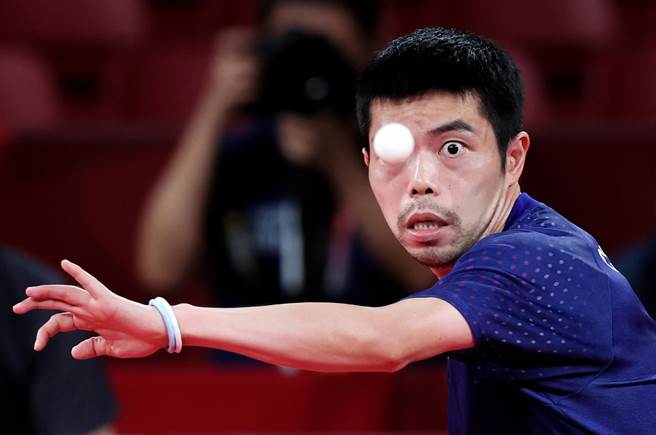 獲得台灣新聞攝影大賽體育類第一名的余承翰以一張在東京奧運桌球國手莊智淵奮力應戰的畫面獲得評審青睞。（主辦單位提供）