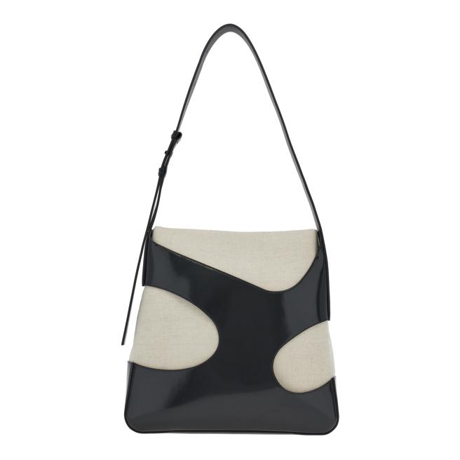 FERRAGAMO鏤空剪裁黑色皮革白色帆布手提包，8萬5900元。（FERRAGAMO提供）