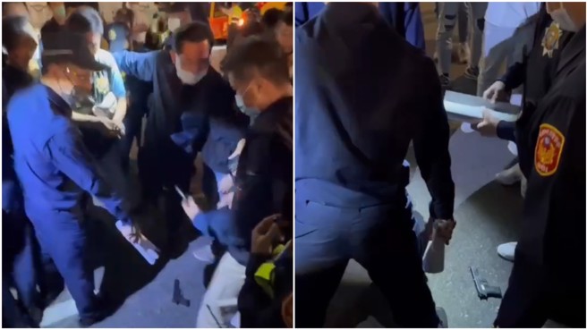 鄭運鵬今（10）日晚舉辦大園、觀音、新屋聯合後援會成立大會，現場一名男子排隊入場時，隨身攜帶的玩具手槍掉出來。（翻攝畫面，民眾提供）