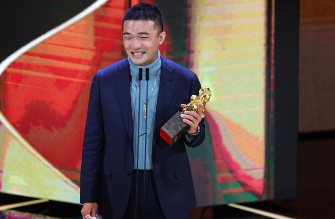 胡智強憑在《一家子兒咕咕叫》的精湛演出，奪下第59屆金馬獎《最佳新演員》獎。(圖/石智中)