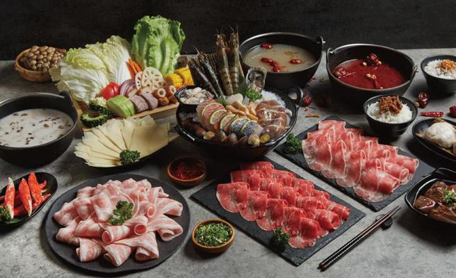 （筑间幸福锅物北屯军功店及南屯永春店营业到凌晨，主打蔬食锅料自助吧放题，挑战重划区的宵夜市场。图／筑间餐饮集团提供）