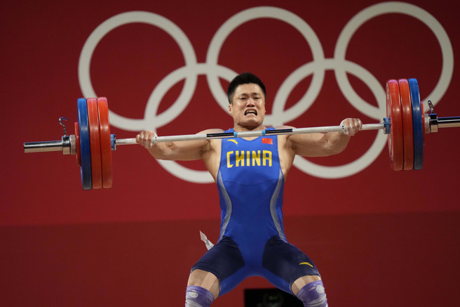 38岁的吕小军仍活跃于举重界。(美联社)