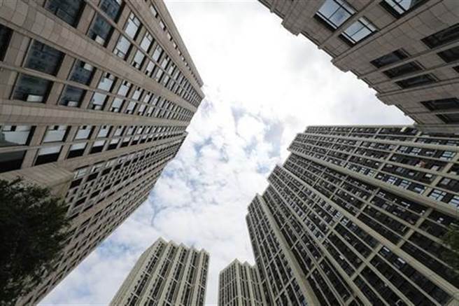 鼓励民眾买房，东莞全域放开住房限购。（新华社）