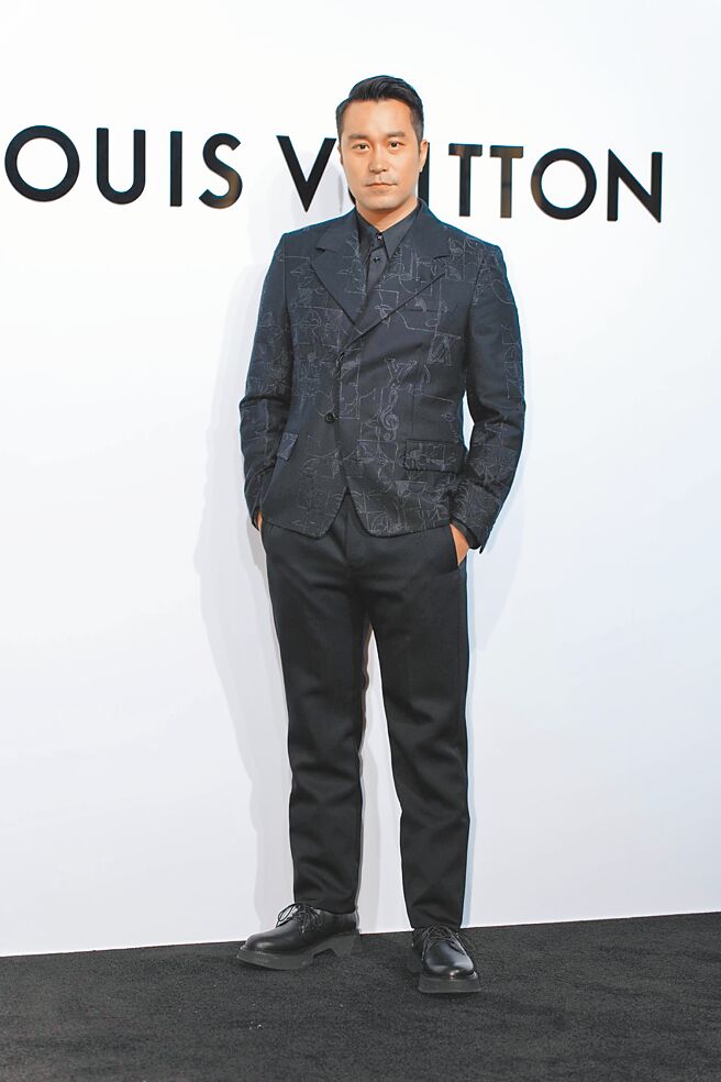 張孝全一身低調黑色，沉穩展現台灣男神風範。（吳松翰攝）