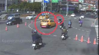 超車不成槓上小黃 機車男攔截司機在馬路上演肉搏戰