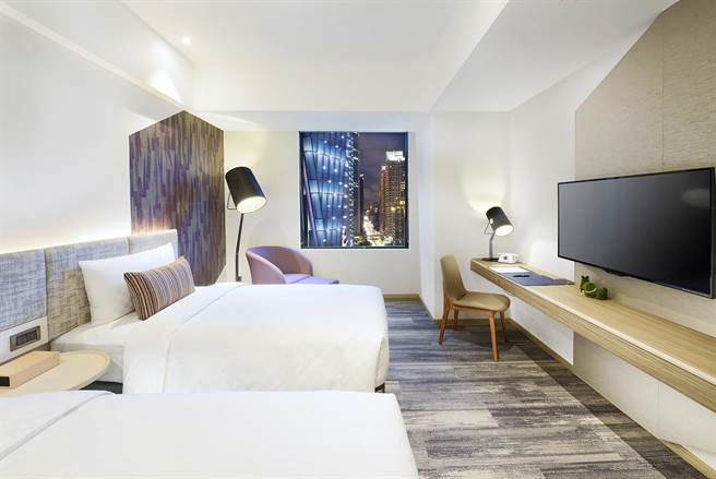 台北趣淘漫旅「趣淘甜心饰妳」住房专案，每晚2399元起，照片为探索双人客房。(趣淘漫旅台北提供)