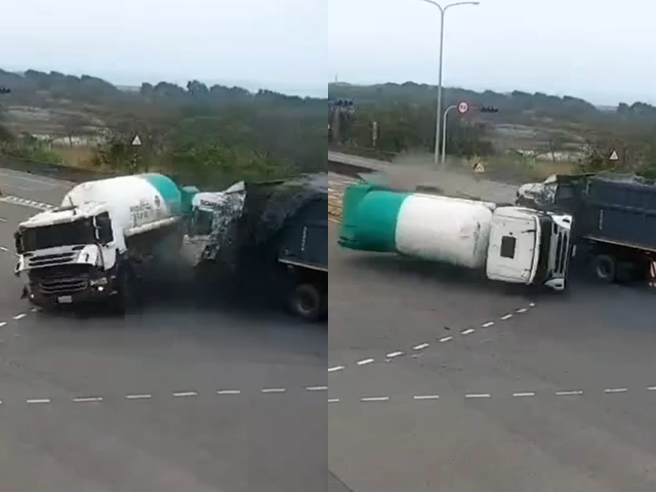 化學槽車在路口疑似違規從外側左轉，遭後方大貨車攔腰撞翻，槽車當場側翻在路面，水平幾乎轉了180度，驚悚事發影片曝光。（翻攝畫面）