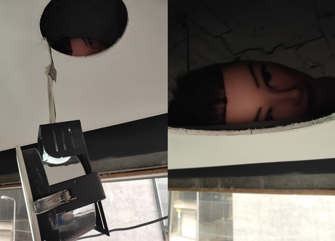 有名水电师傅在髮廊装修灯具时，在天花板内发现一颗假人头，害他吓一跳。（翻摄自脸书水电工联盟）