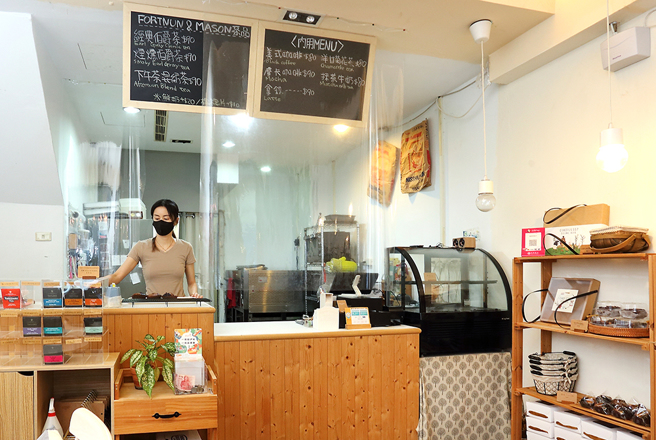 偏愛鄉村風格的甜點師Jessy，為小店妝點溫馨的居家感。(攝影/Carter)