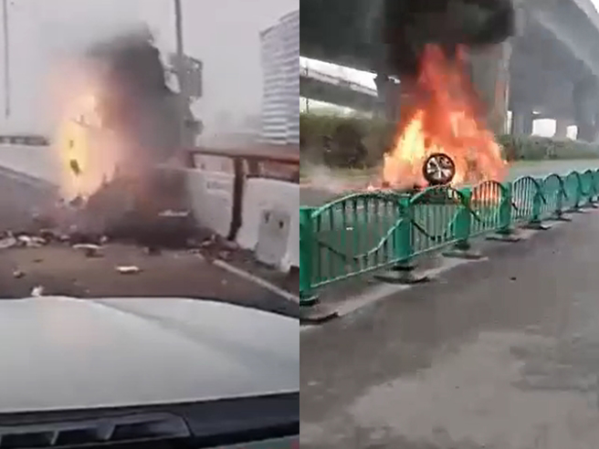 轿车失控撞击路中防撞水箱，整辆车弹起炸出零件，接着飞到另一侧「掉落高架道路」，整辆车起火被烧得清光，驾驶当场死亡。（翻摄自记者爆料网）