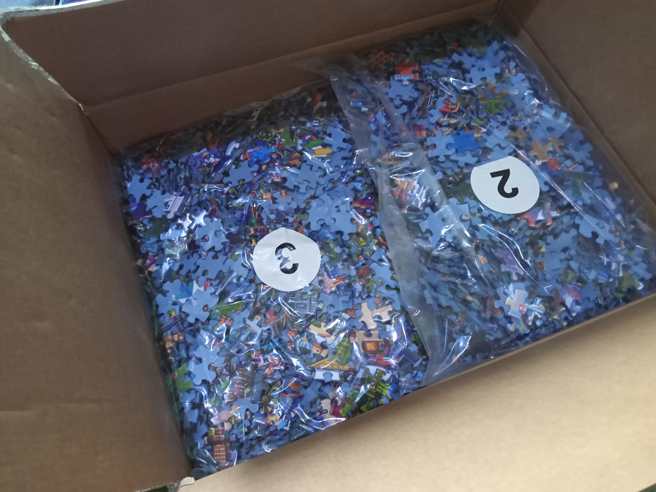 原PO打开发现拼图是切成60份，每份1千片。(翻摄自Costco好市多 商品经验老实说FB)