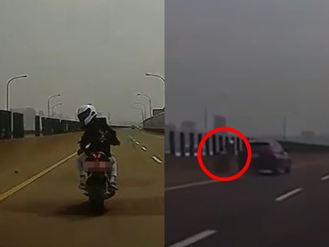 事隔一天BMW車主現身公開行車紀錄器，原來「事發前」騎士好幾度惡意逼車，BMW最後從左側鑽出，車身猛晃一下疑似才撞到重機。（翻攝畫面）