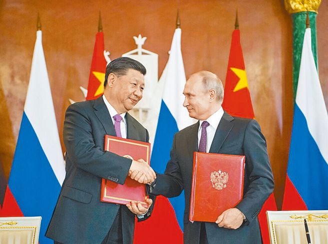 胡锡进：中俄往全球化走，绝不会指向对抗和分裂。（图／新华社）