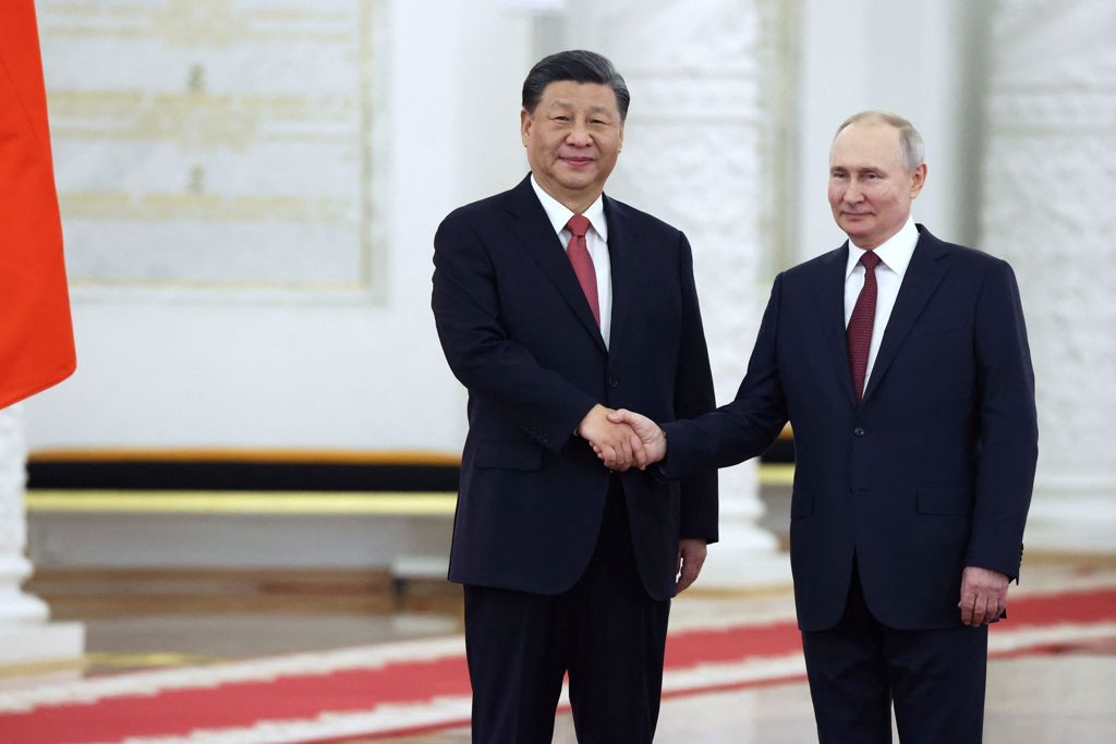 2023年3月21日，俄罗斯总统普丁在克里姆林宫上与中国大陆领导习近平握手。（路透社）(photo:ChinaTimes)