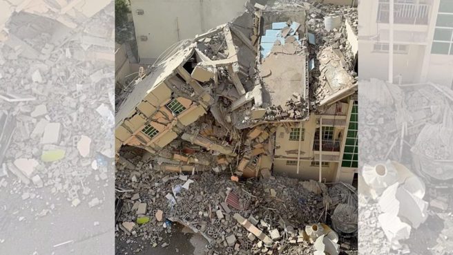 杜哈一栋4楼公寓突然倒塌，向侧边倾倒。(图/Twitter)