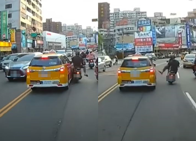 1名二寶爸騎士不明原因和計程車發生行車糾紛，2車竟然在大馬路上做出危險舉動。（翻攝自YouTube頻道「WoWtchout - 地圖型行車影像分享平台」）