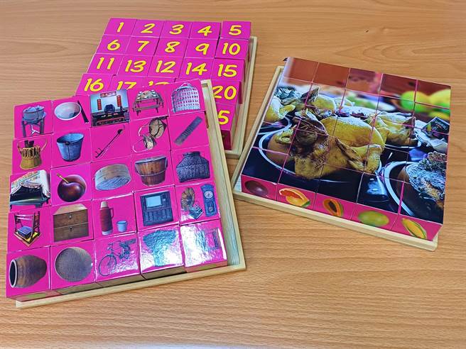 苗栗醫院「田心寶智能學堂」特別團體活動積木，運用數字、圖示、懷舊照片訓練不同認知功能。（王家瑜攝）