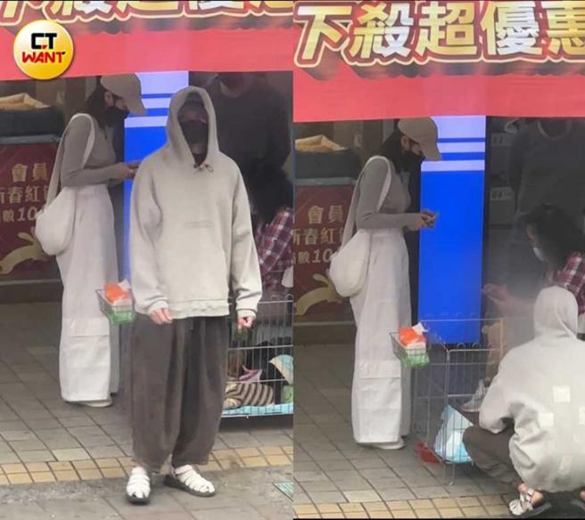 王净看似与志工交换联络方式期间，曹佑寧则在旁边一下转圈，一下摸狗。（图／本刊摄影组）