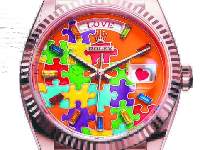 劳力士推出一款色彩缤纷的Day-Date 36腕表，日期窗和星期窗会出现可爱图案与字句。（ROLEX提供）