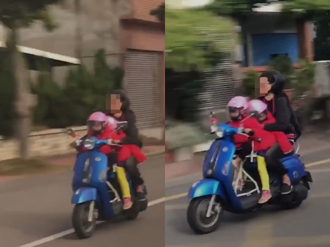 一名母亲日前被目击骑机车载着2名女儿三贴上路，女儿不但在女子前方，画面中最前头的女童疑似还把双手放在龙头把手上，画面相当惊险。（翻摄自记者爆料网）
