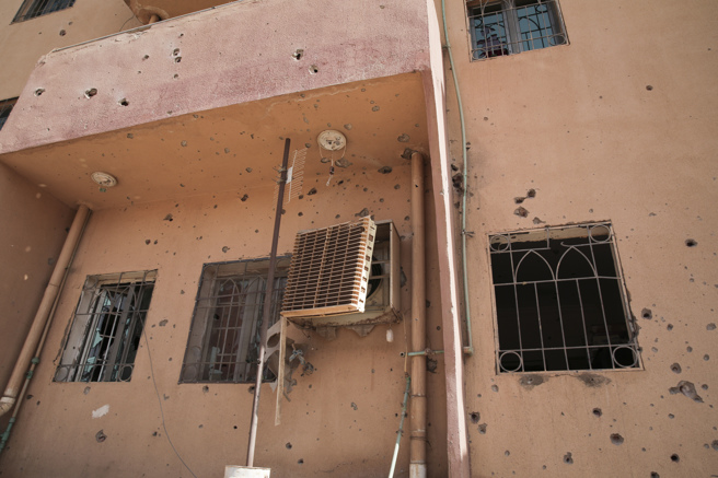 喀土穆民宅满是弹痕，怵目惊心。（图／美联社）