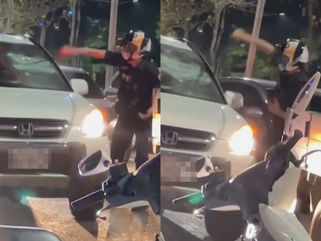 员警掏出警棍对方仍不配合，因此猛砸车窗一连30多下，没想到车窗被砸到碎裂，员警也几乎累到没力再砸，对方仍直接倒退驶离。（翻摄自脸书「爆料公社」）