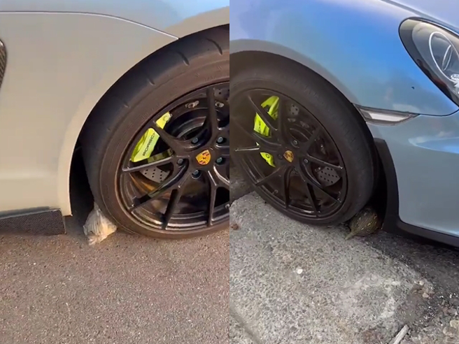 保时捷GT4昨违停在路口，疑似因当住一名卖水果的摊商老伯，老伯竟直接把水果塞在保时捷4个轮胎前，还呛车主压坏水果就要付钱。（翻摄自记者爆料网）