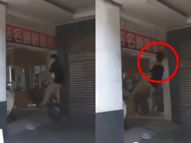 越野自行车玩家日前在台南街头骑车，在一处骑楼准备展现「豚跳」技巧时，将车身大力抬起瞬间，头竟直接往上方招牌撞，整个人向后倒地。（翻摄自脸书「重机车友 ❘ 各区路况天气、资讯分享中心」）