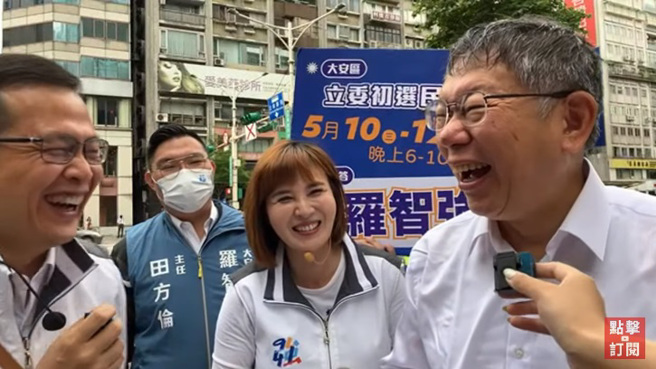 国民党台北市前议员罗智强（左）9日上午扫街时，巧遇上班途中的民眾党主席柯文哲（右）。（图／翻摄自野电视 94强YT）