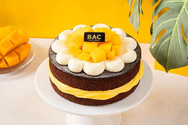 迎接夏日到来，BAC推出「百镶鲜芒果蛋糕」与「鲜芒果奶油起司盒」，攻上夏日芒果季舞台C位。（图／BAC提供）