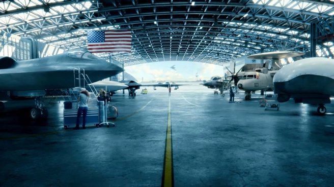 诺格发布的影片中还角落上摆了2架无人机，其中一架仅露出了尖锐的机头，另外一架是飞翼形态。(图／诺格公司） 