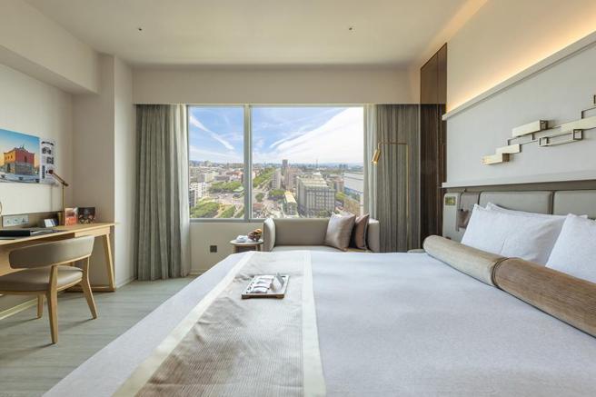 台北花园大酒店推出「游艺花园 猫CATS音乐剧」住宿优惠，每晚12,999元起，除可入住雅致客房，更可获得总价值11,600元的经典百老匯音乐剧「猫CATS」门票共两张。（图／台北花园酒店提供）