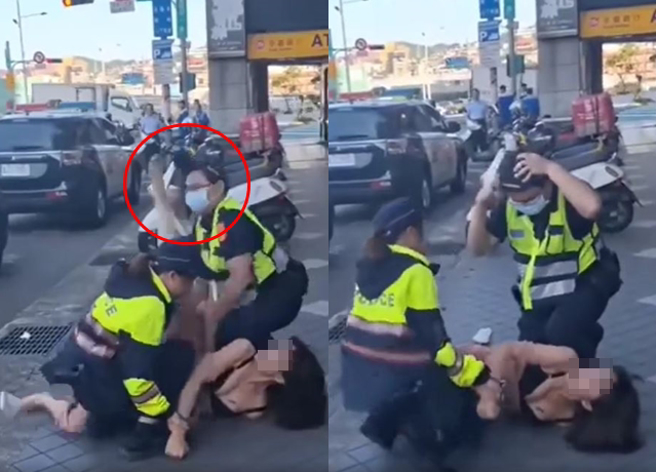 叫嚣女子遭员警大外割压制后，仍不断想抵抗，甚至趁隙对着男警剔了一脚，所幸仅警帽遭踢到。（翻摄自爆料公社公开版）