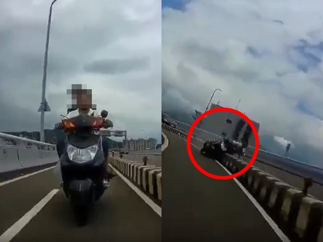 一辆双载机车被目击车上2人不但没戴安全帽，还在高架桥机车道上飙驶超车，最后在一处弯道竟擦撞护栏，2人当场摔飞到汽车道上。（翻摄自脸书「爆废公社二馆」）
