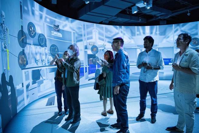 南科特展结合5G技术，让观眾身歷其境，了解史前文化。（5G技术示意图／南科考古馆提供）