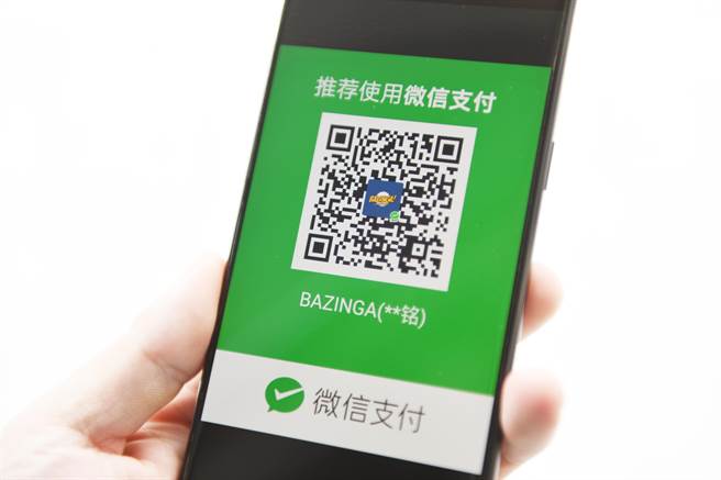 一位男子到上海出差时，以为用信用卡、手机微信支付就能打天下，没想到很多服务都需要通过门号取得认证码，让他直呼不如路边乞丐。（示意图：shutterstock／达志）