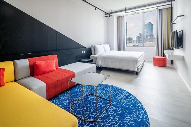 （老爺酒店夏季旅展7/14開賣，台中大毅老爺與台南老爺「雙城聯賣住宿券」每套6,999元起，持券均可入住四人家庭客房。圖／老爺酒店集團）