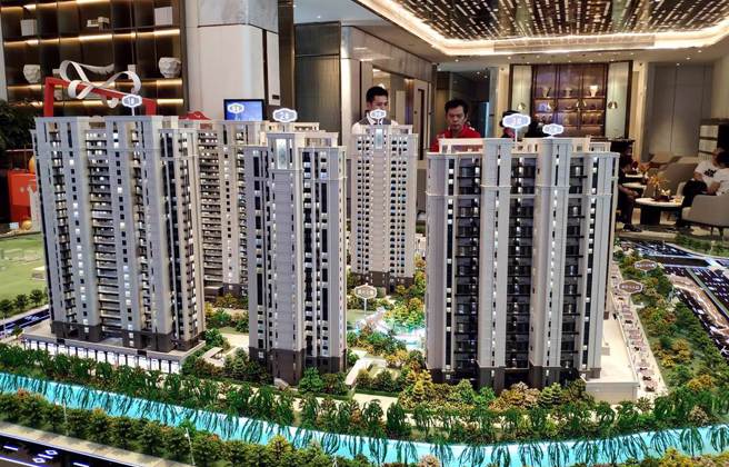 今年以来大陆官方首次承认房价普遍下滑。（图／中新社）