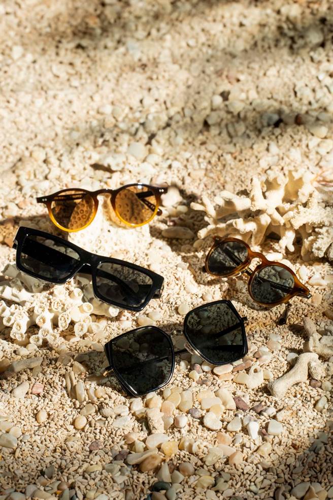 夏日出游，太阳眼镜绝对是必备产品。（上至下）Oliver Peoples渐层玳瑁色胶框太阳眼镜、Oliver Poeples玳瑁色渐进眼镜、Prada方型框太阳眼镜、Emporio Armani大型方框太阳眼镜。（摄影石智中）