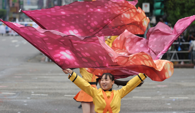 暱稱「橘色惡魔」的日本京都橘高校生去年10月在國慶大會上帶來精彩表演。（圖／中央社）