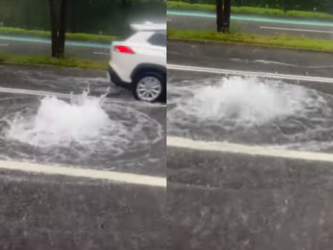 連日豪雨釀奇景，高雄巨蛋旁下水道「湧泉噴射30公分」。（翻攝自影片）
