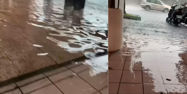 10日下午台北市下起傾盆大雨，大量的水來不及排出，從馬路淹到人行道。（圖／翻攝自何志偉臉書）