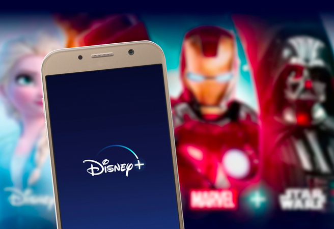 美國娛樂巨擘迪士尼今天宣布，將調漲串流服務訂費，並將打擊寄生帳號，股價盤後聞訊漲近3%。（示意圖/shutterstock）