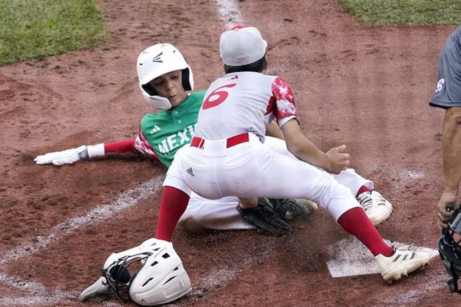 日本区少棒代表队6比1战胜墨西哥代表队。（美联社）